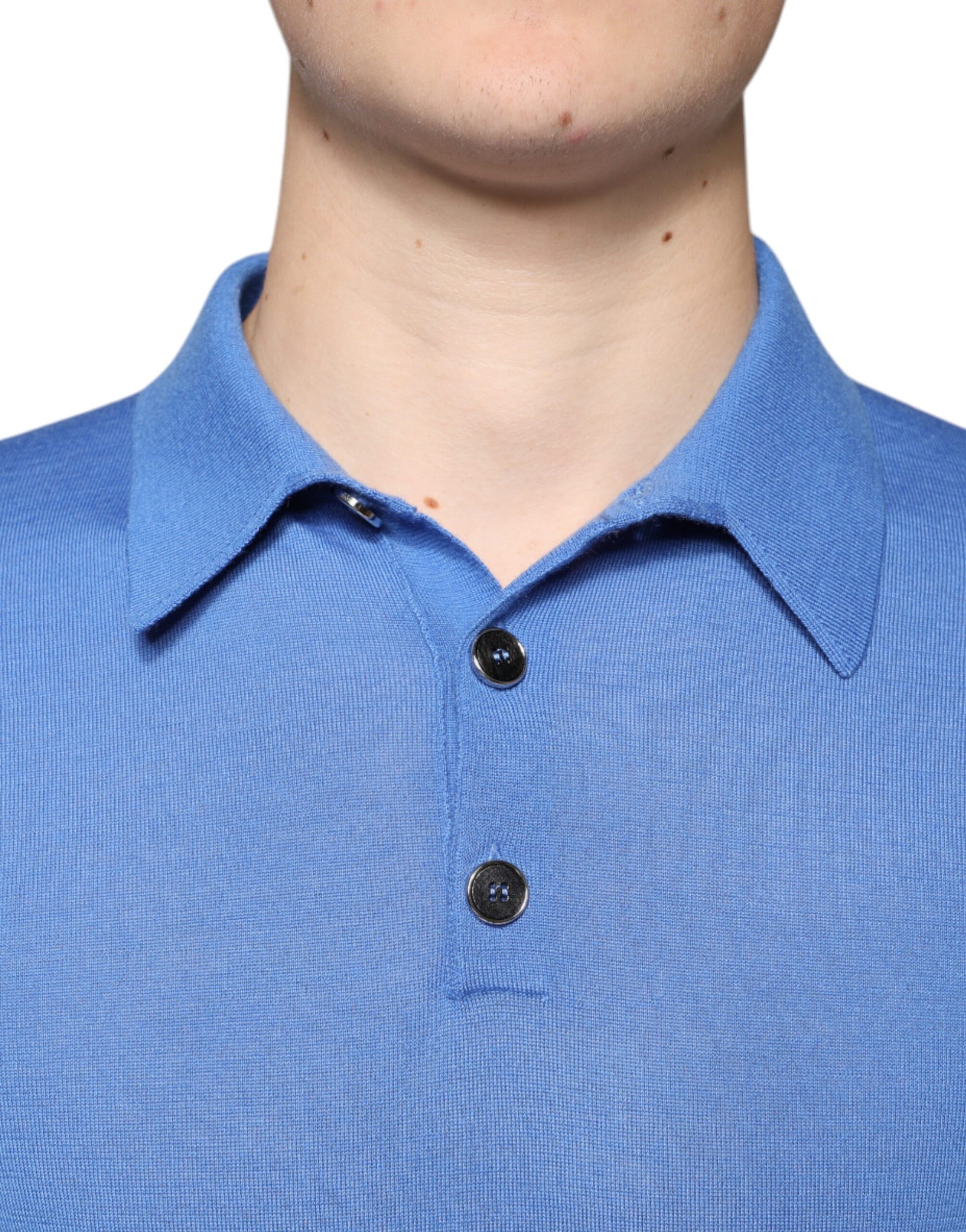 Blue polo shirt with black buttons