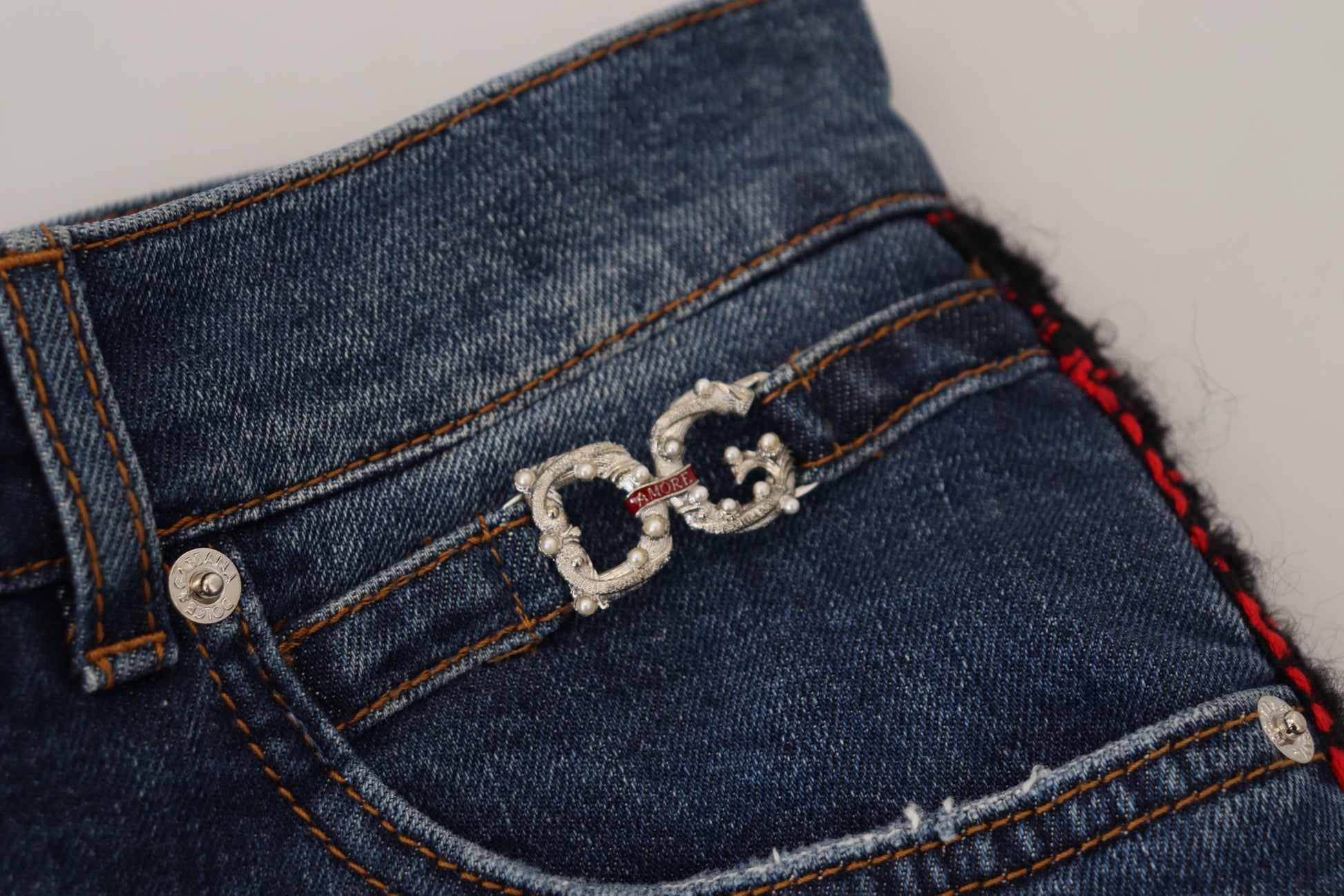Blue jeans with silver buckle on waistband