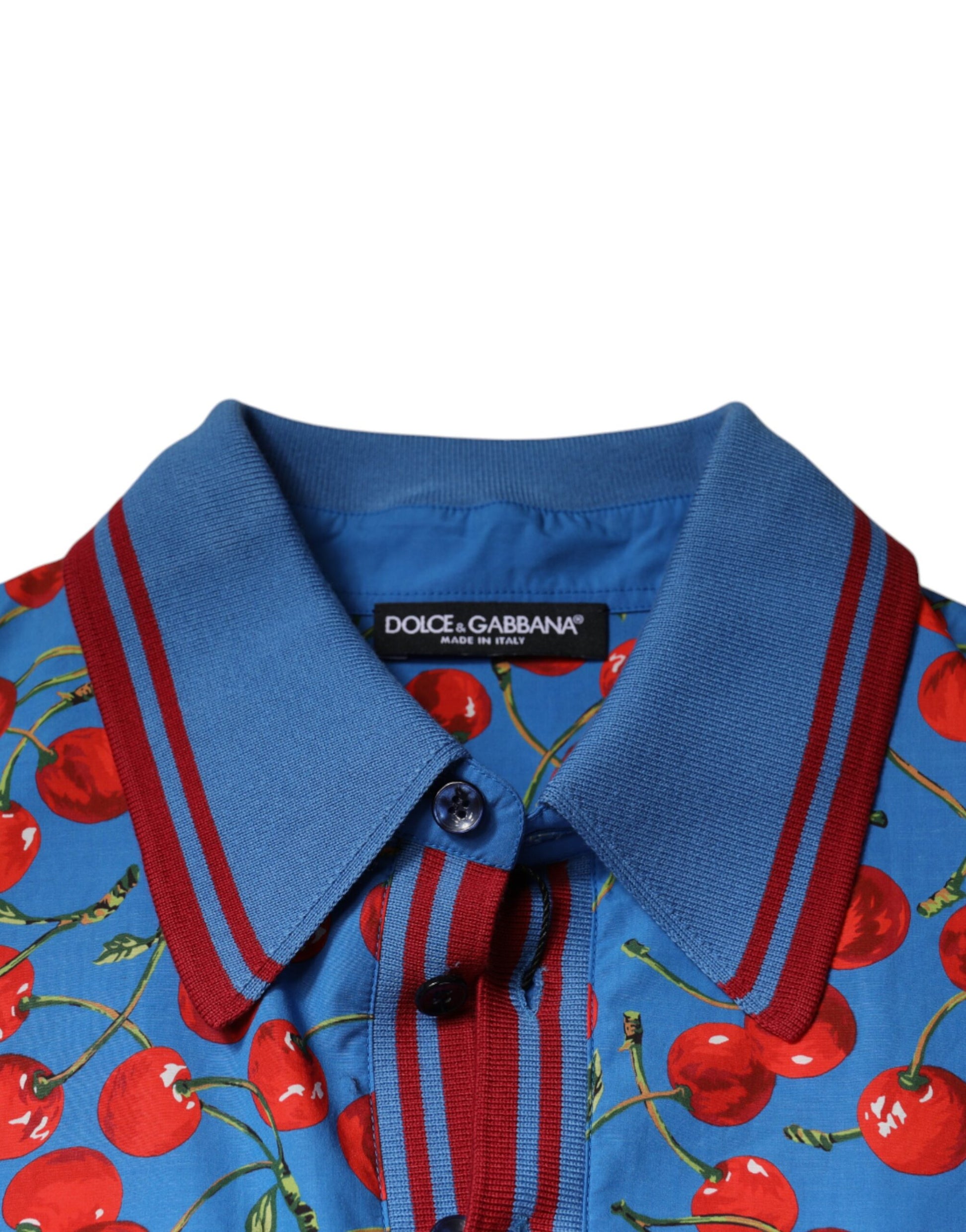 Blue shirt with red cherries on collar