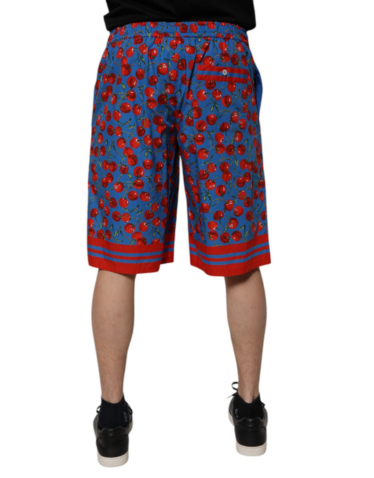 A pair of men's shorts with a blue cherry print on a white background
