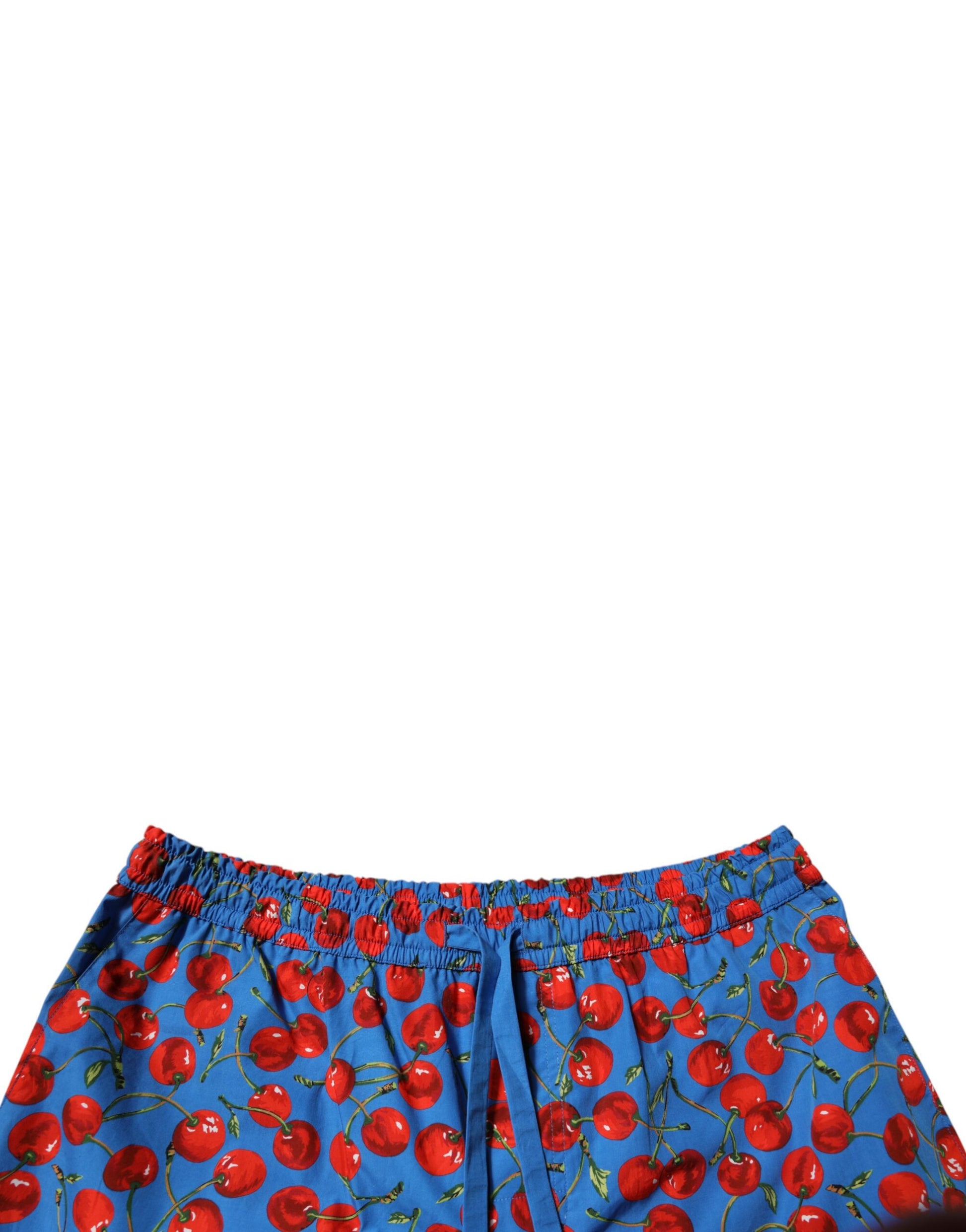 A pair of blue men's shorts with a cherry print design