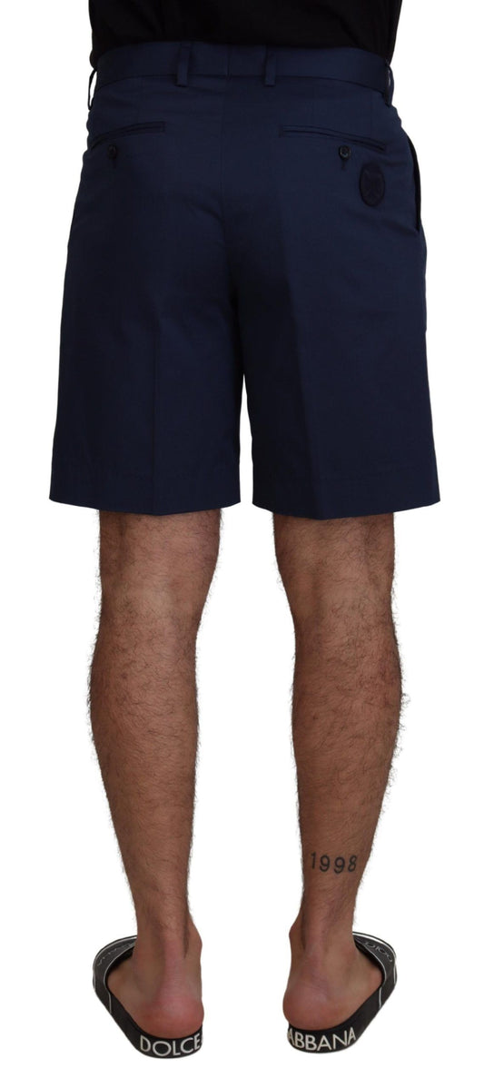 Navy blue shorts with black straps on a mannequin