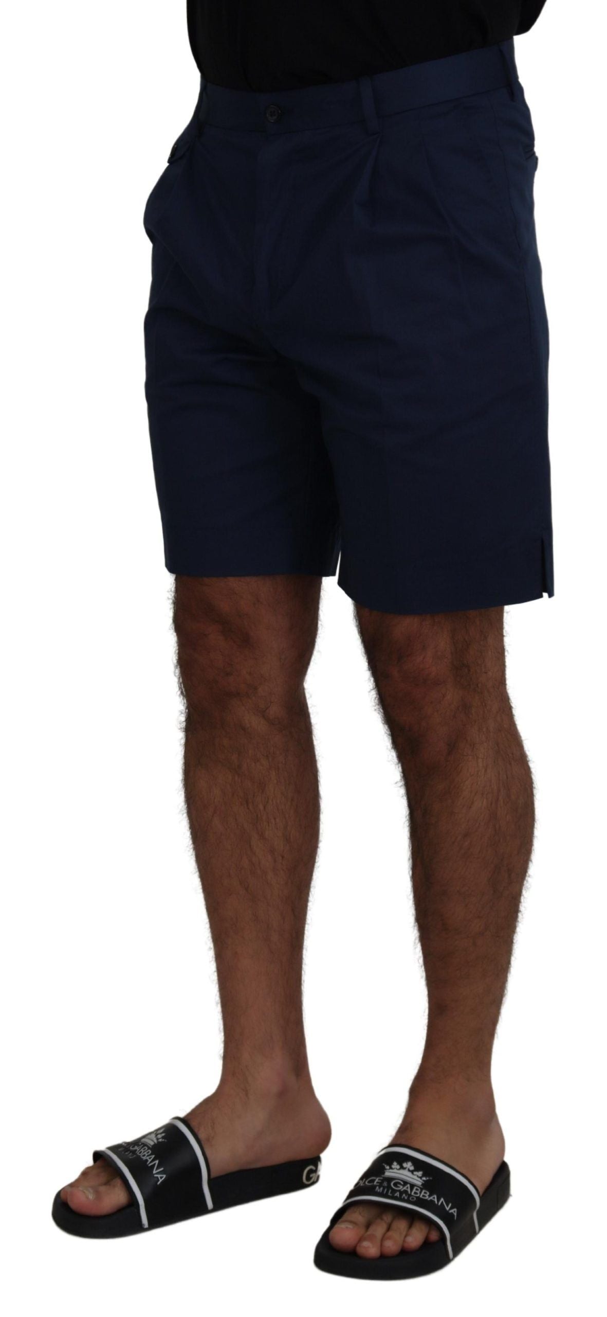 Man wearing shorts and sandals