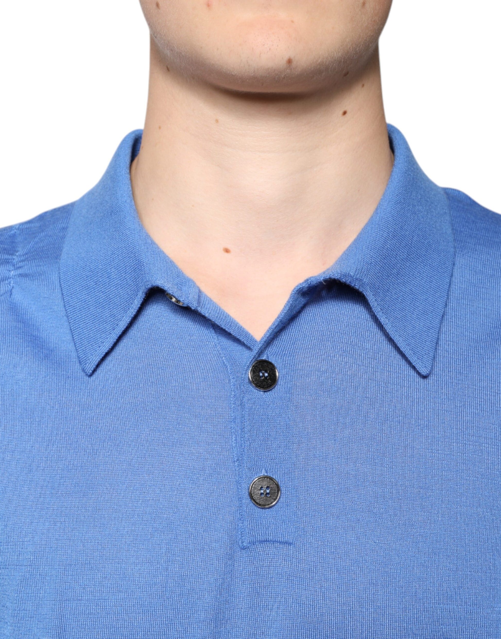 Blue polo shirt with black buttons