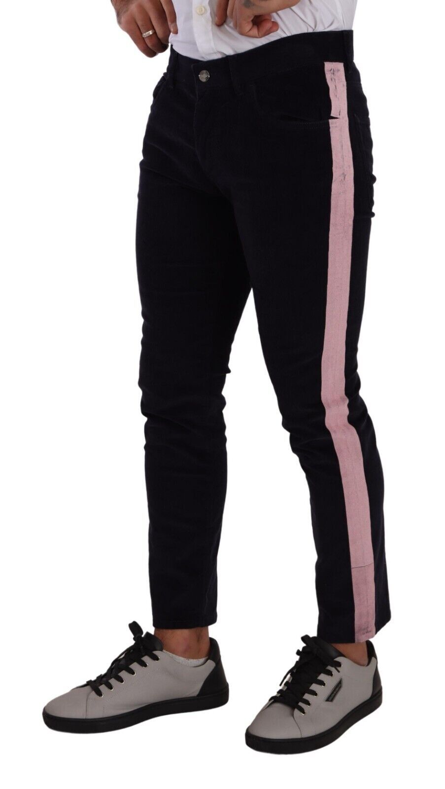Pair of pink and black trousers worn by a person