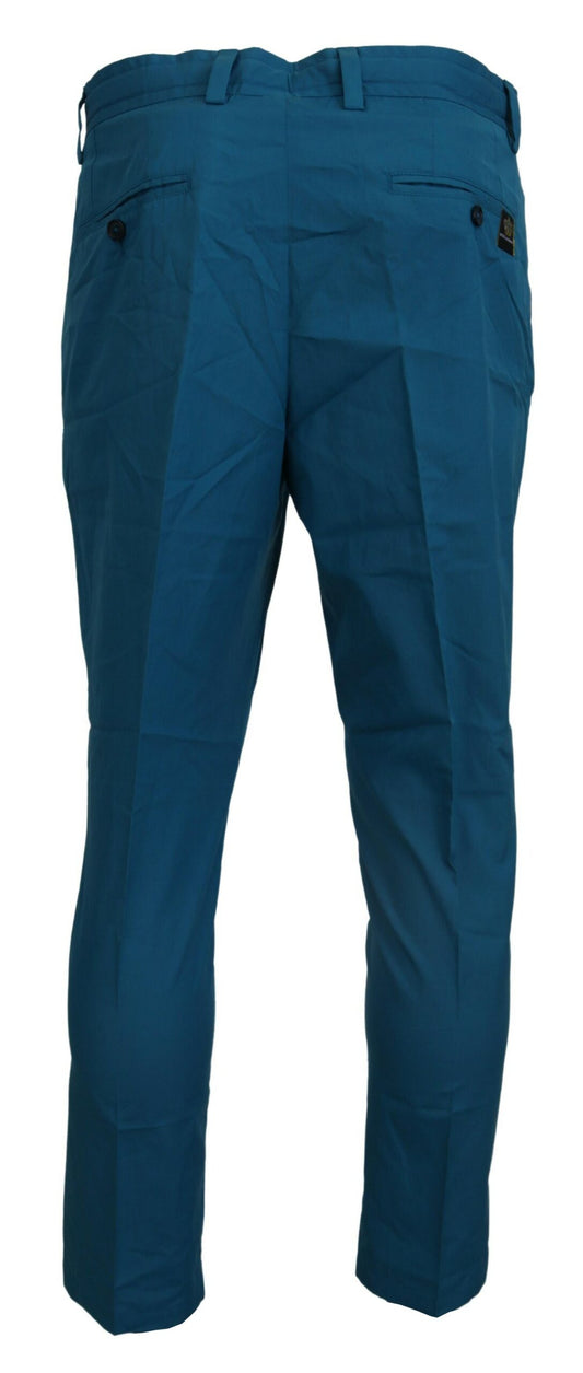 Blue cargo pants on a hanger