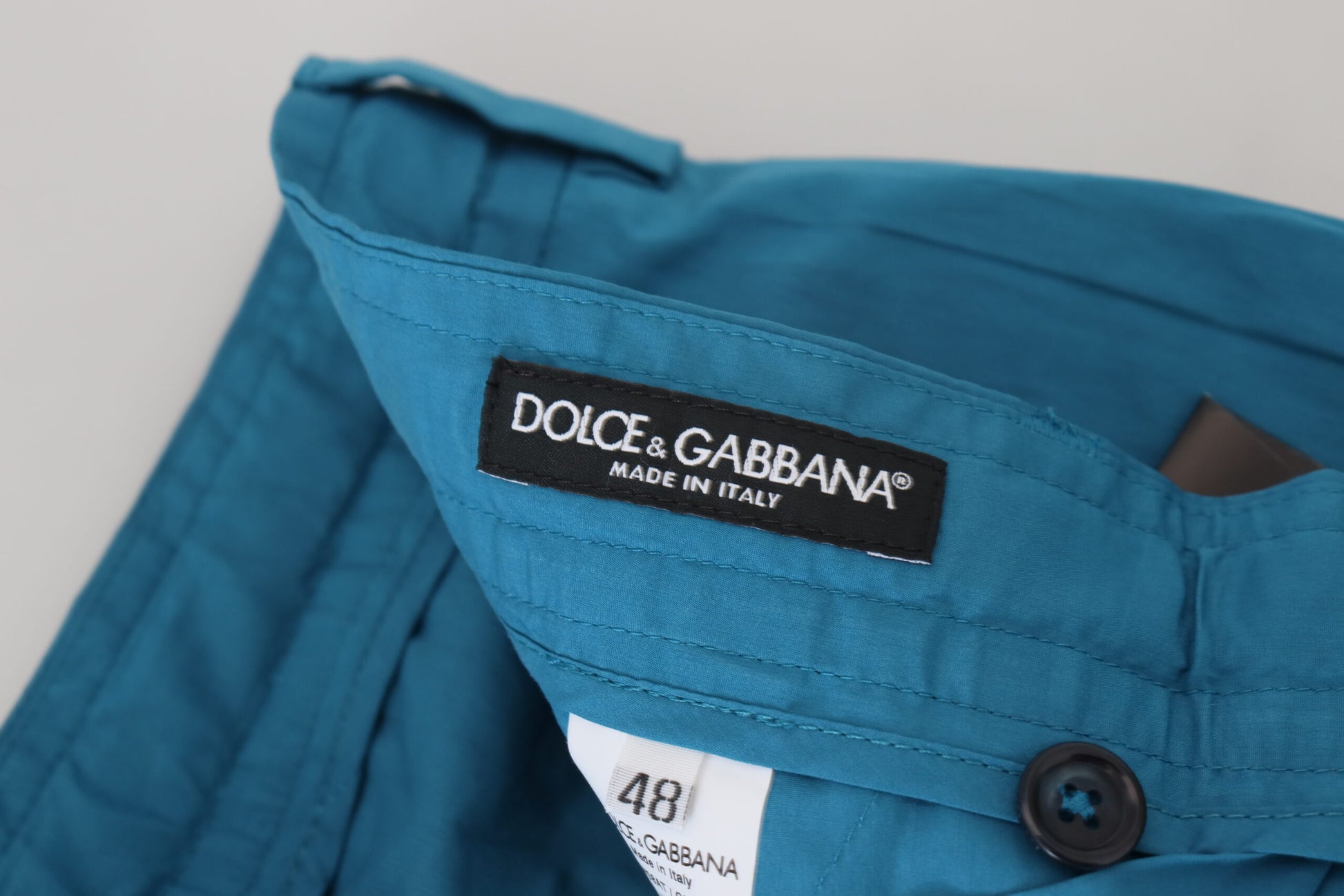Blue jacket with black label on front