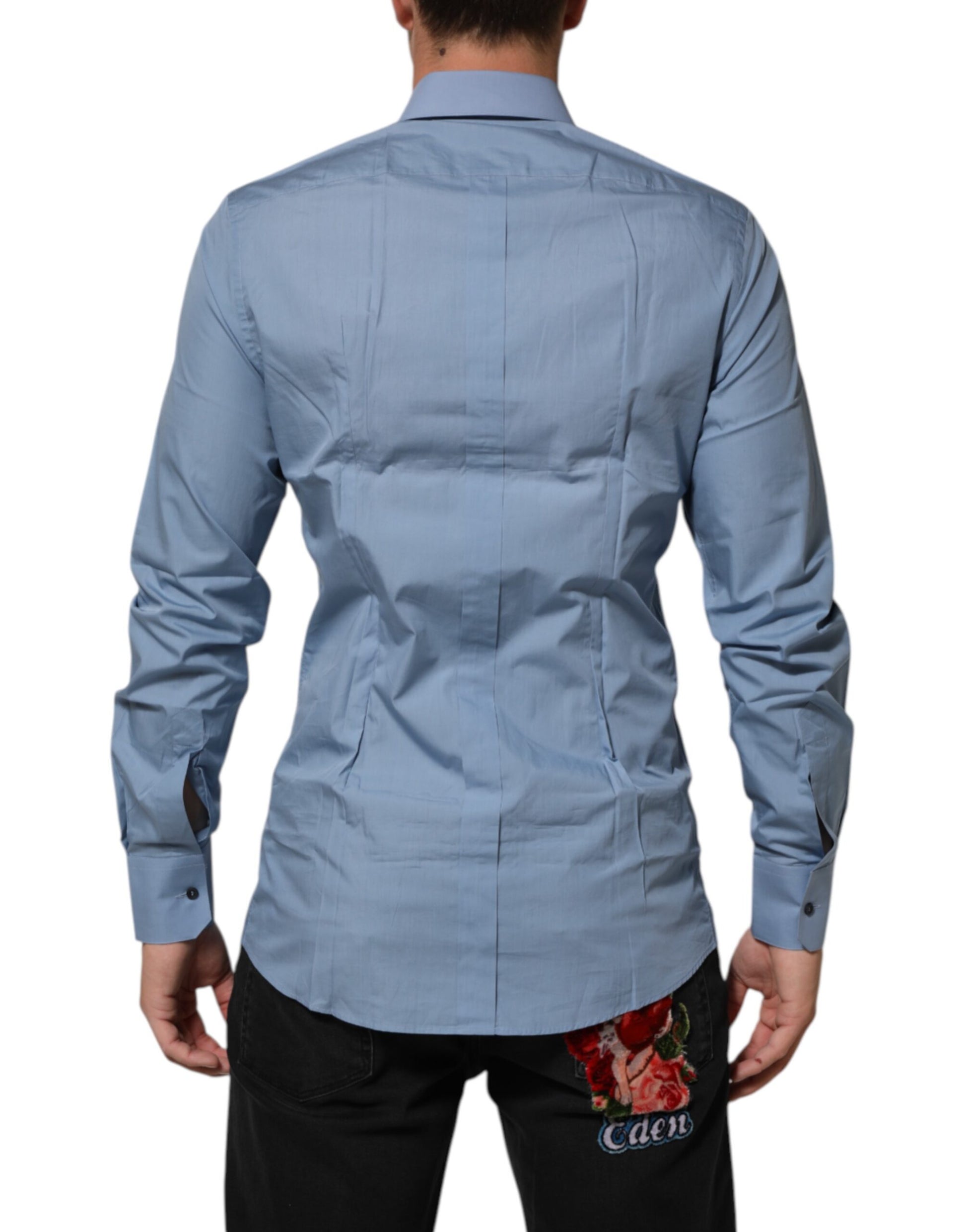 A blue collared dress shirt with gold accents, part of a formal wear collection