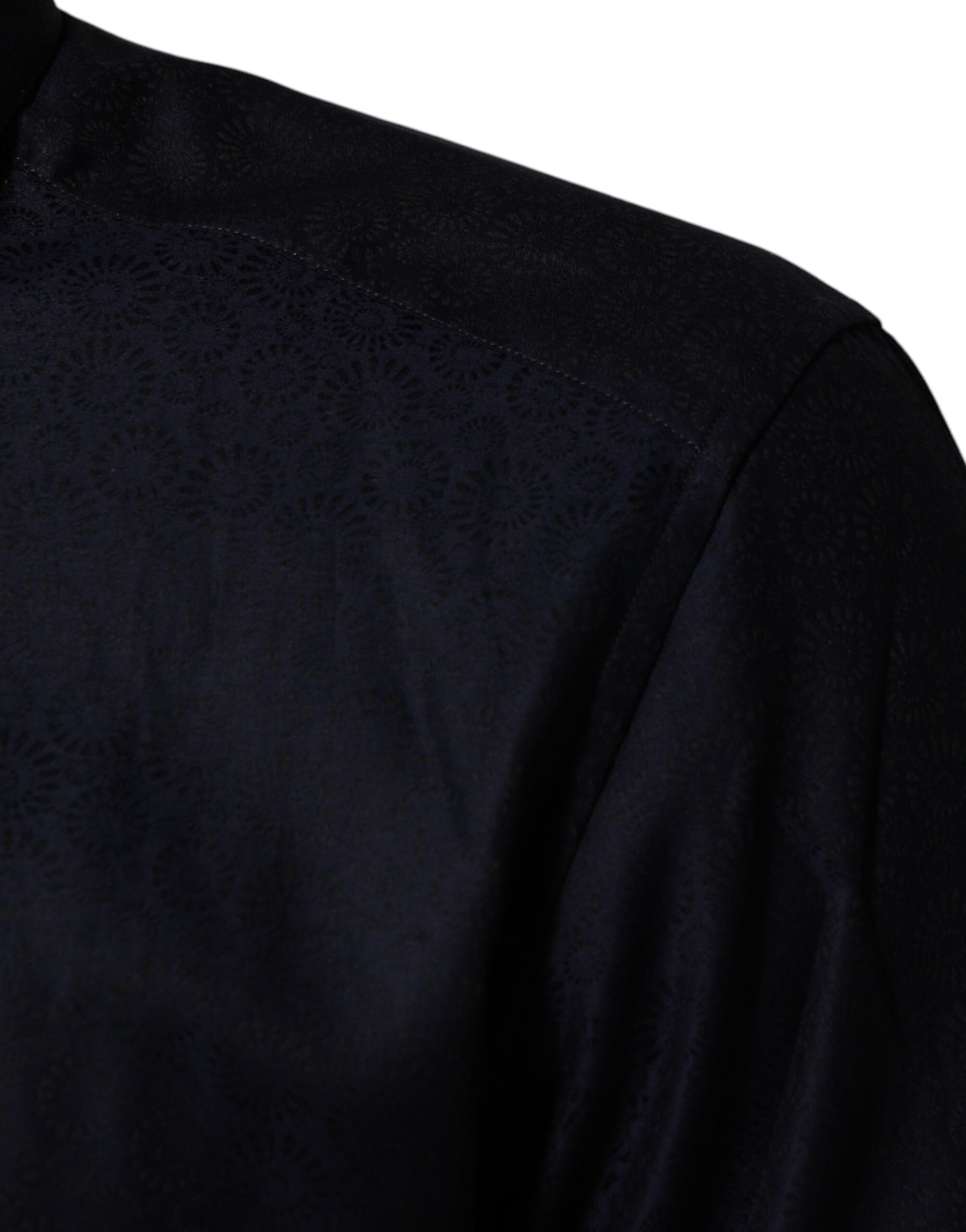 A blue cotton collared long sleeve dress shirt