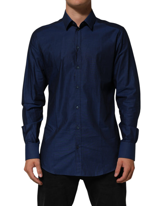 A blue collared dress shirt with long sleeves and buttons down the front
