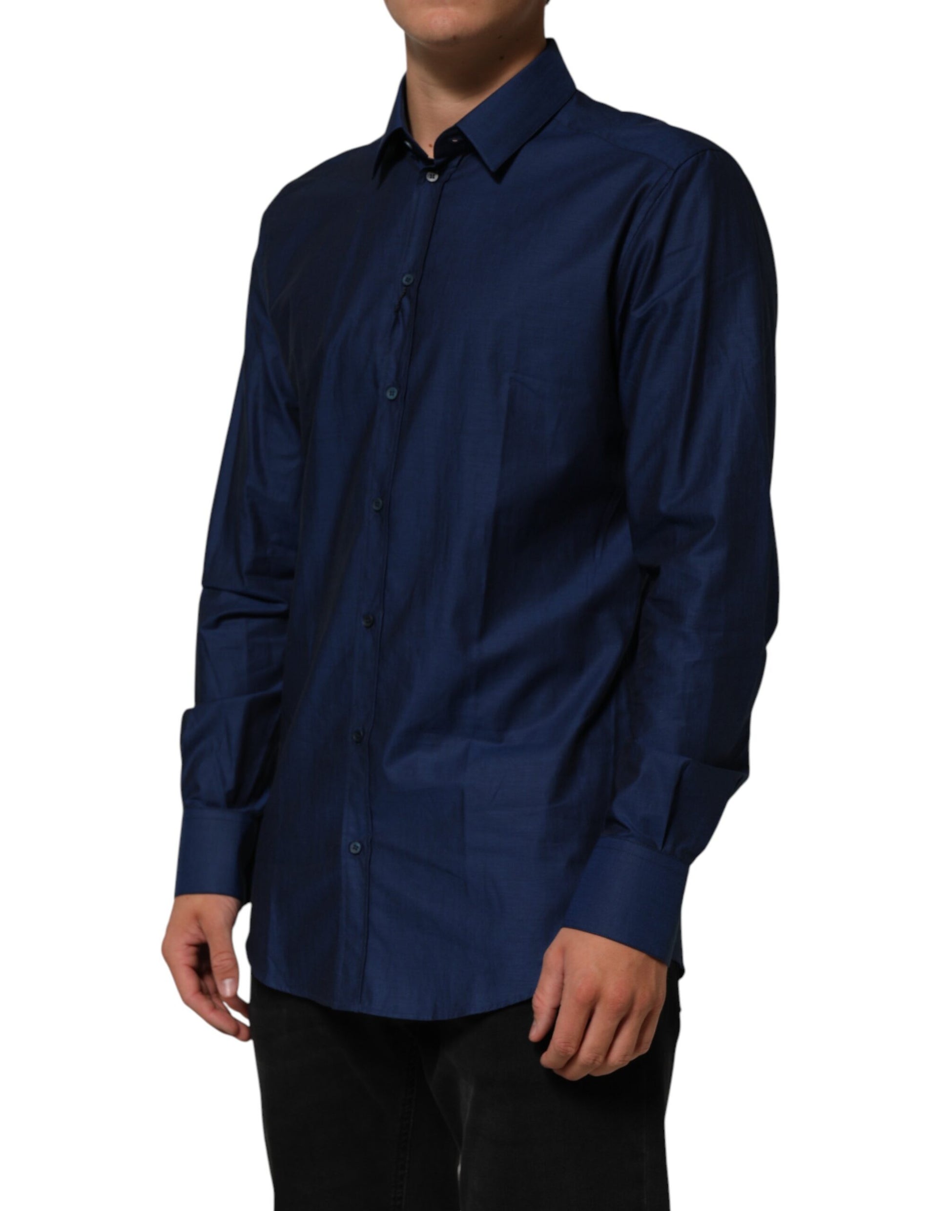 A blue collared dress shirt with long sleeves