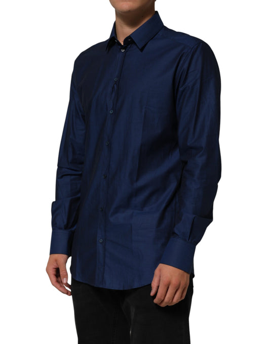 A blue collared dress shirt with long sleeves