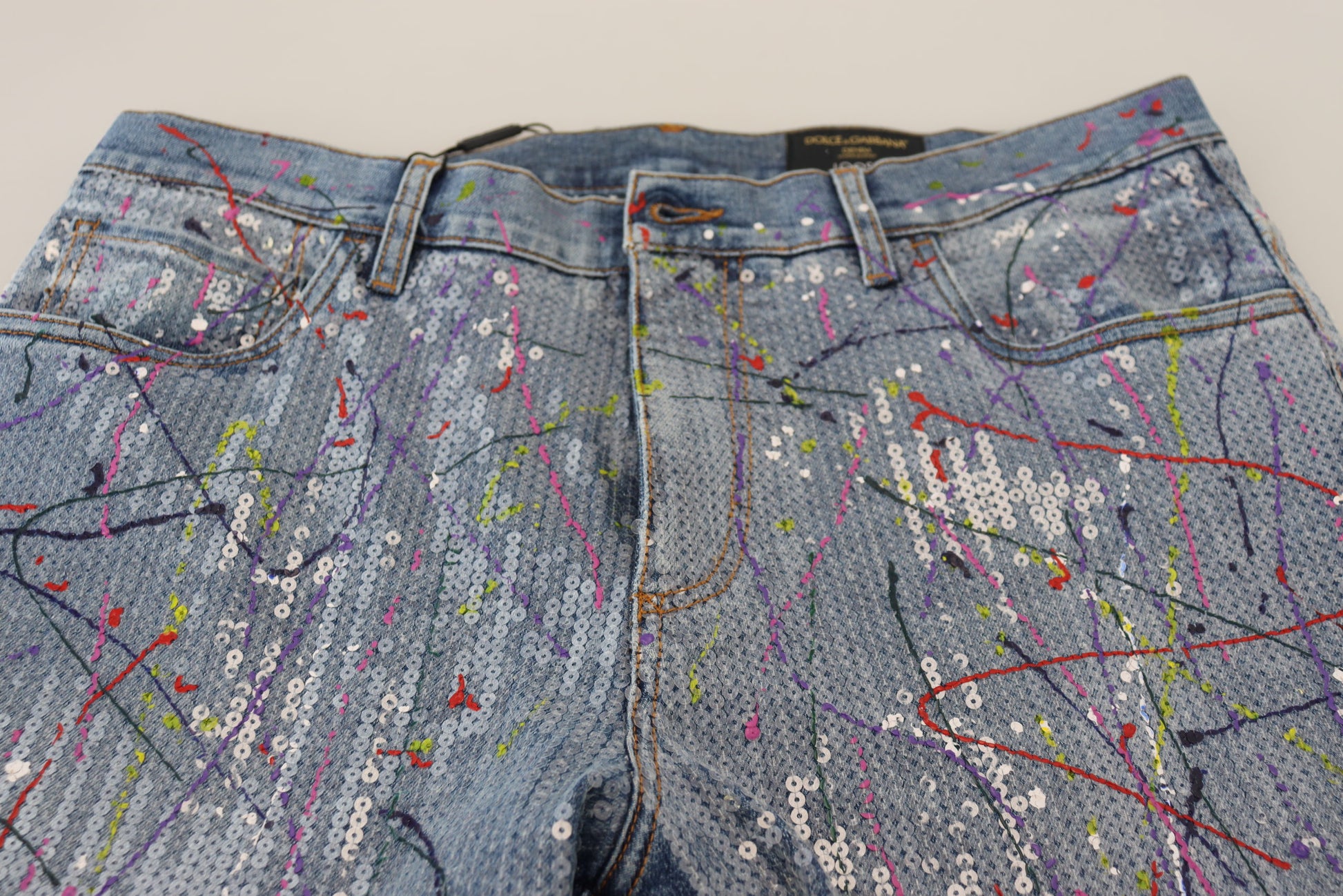 Pair of jeans with colorful pattern on legs