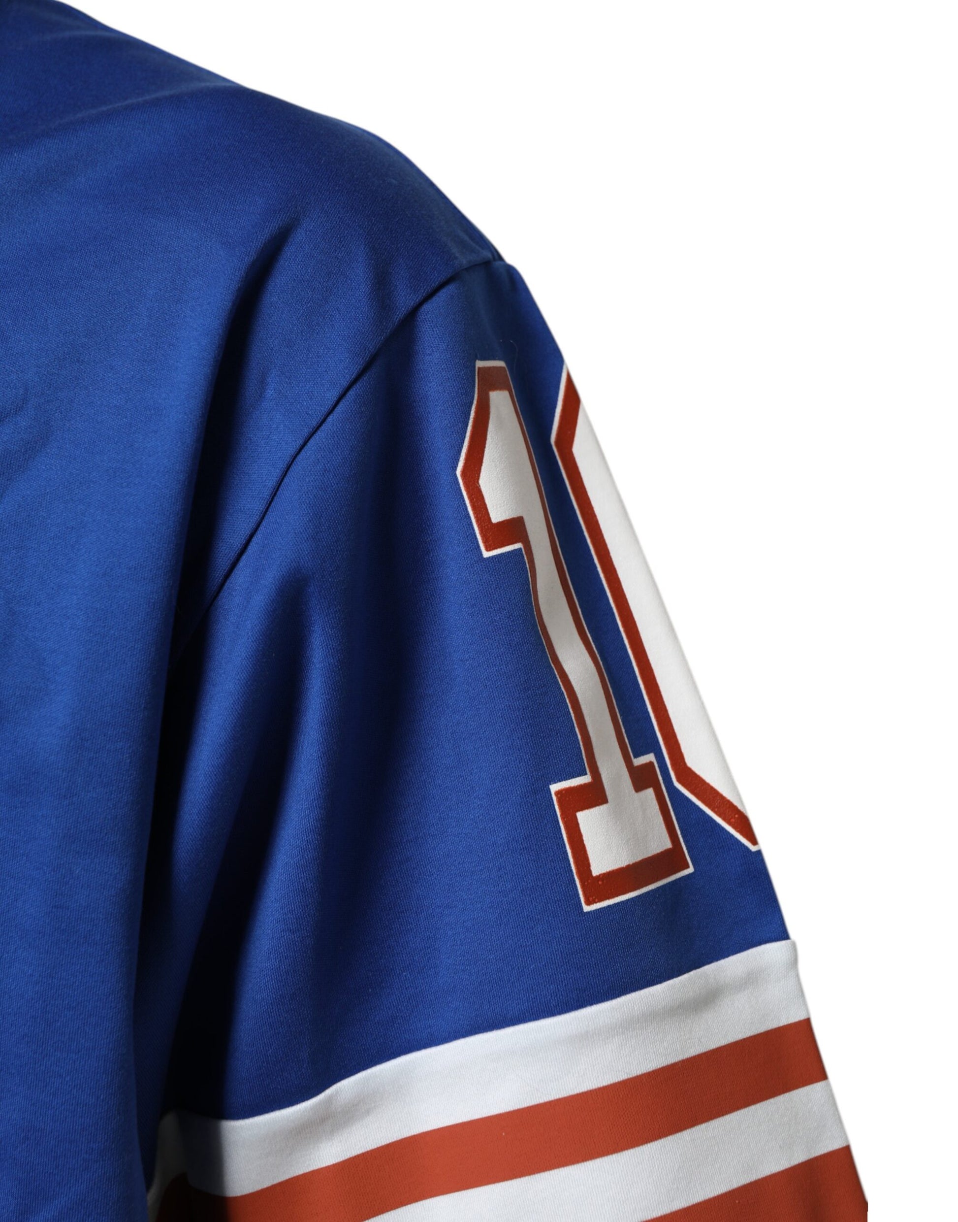 Blue hockey jersey with red lettering and number