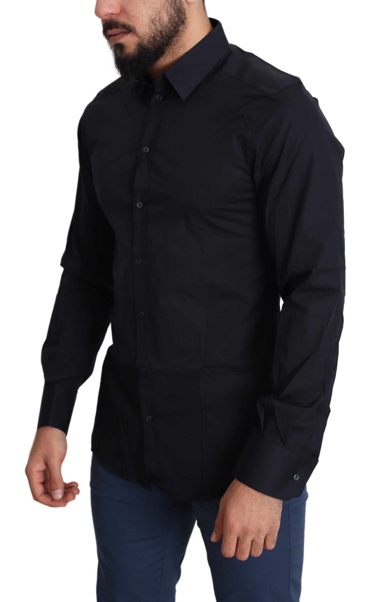 A man wearing a dark blue shirt