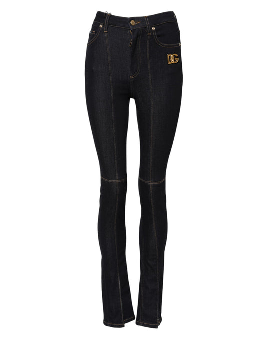 Pair of dark blue jeans with light wash patches on legs