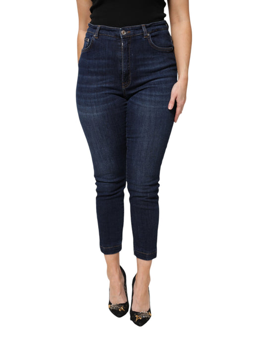 Woman wearing blue jeans and black heels