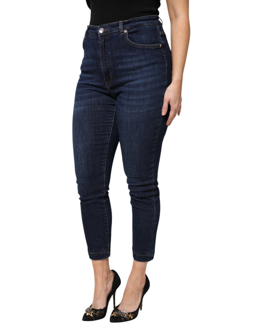 Woman wearing blue jeans and black shoes