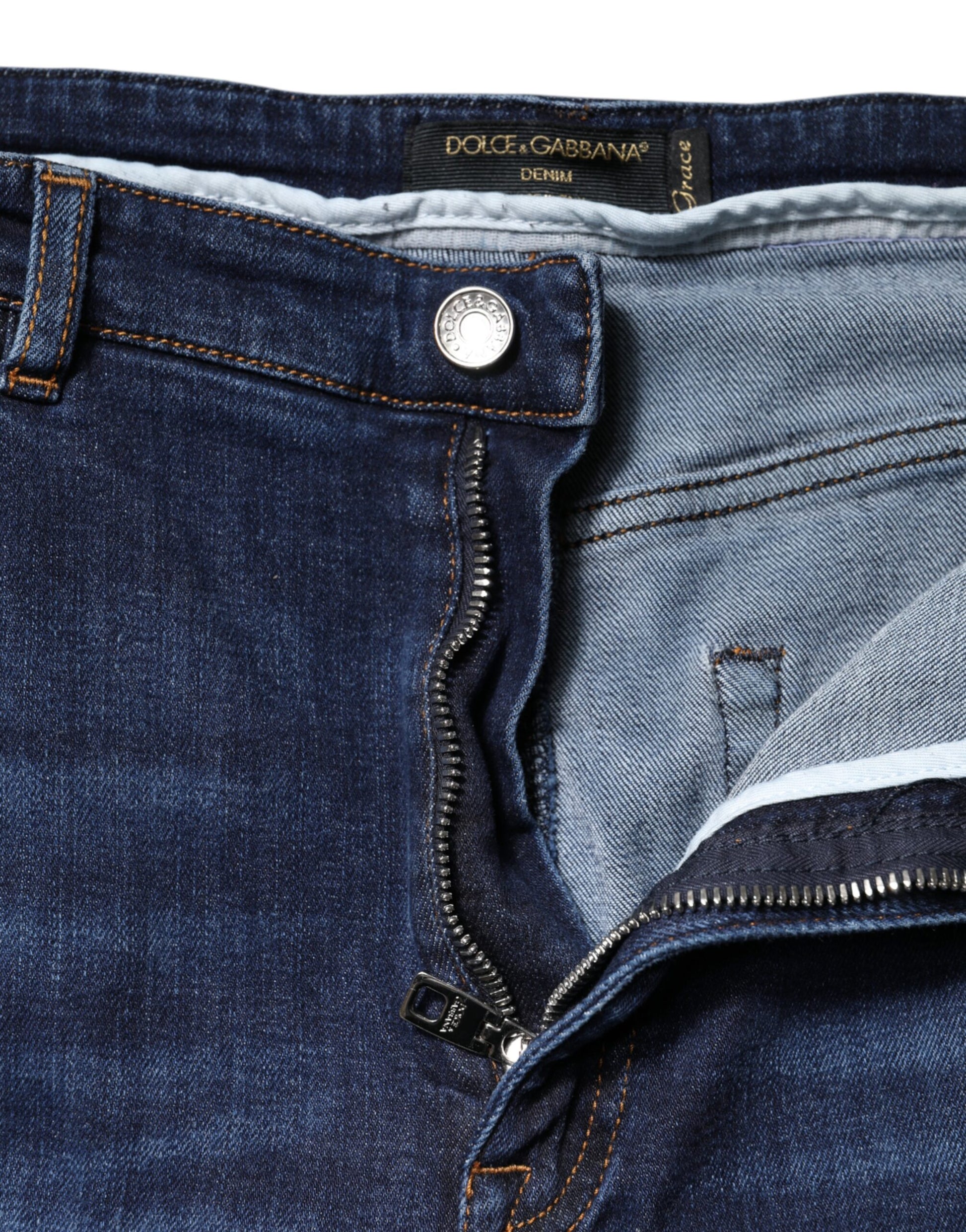 Blue denim jeans with zipper down front