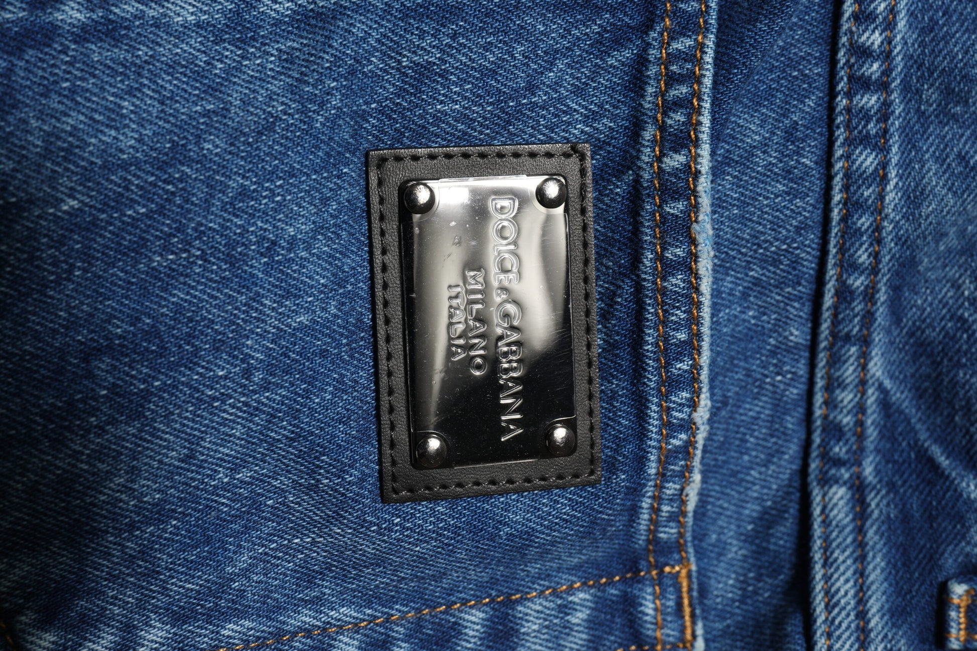 Silver label on blue jeans