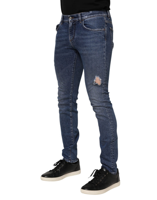 Man wearing blue jeans and black shoes