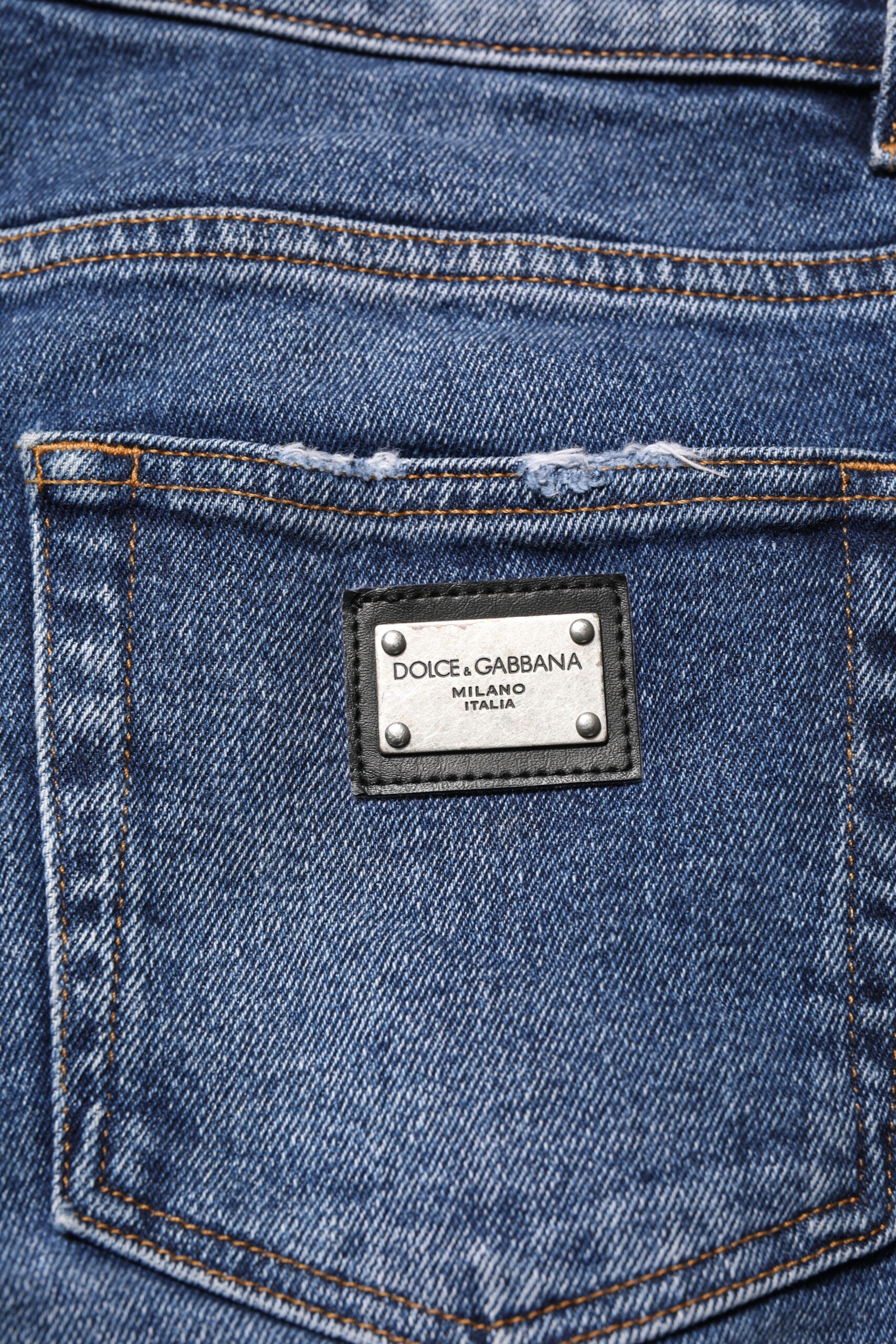 Blue jeans with brand label on back pocket