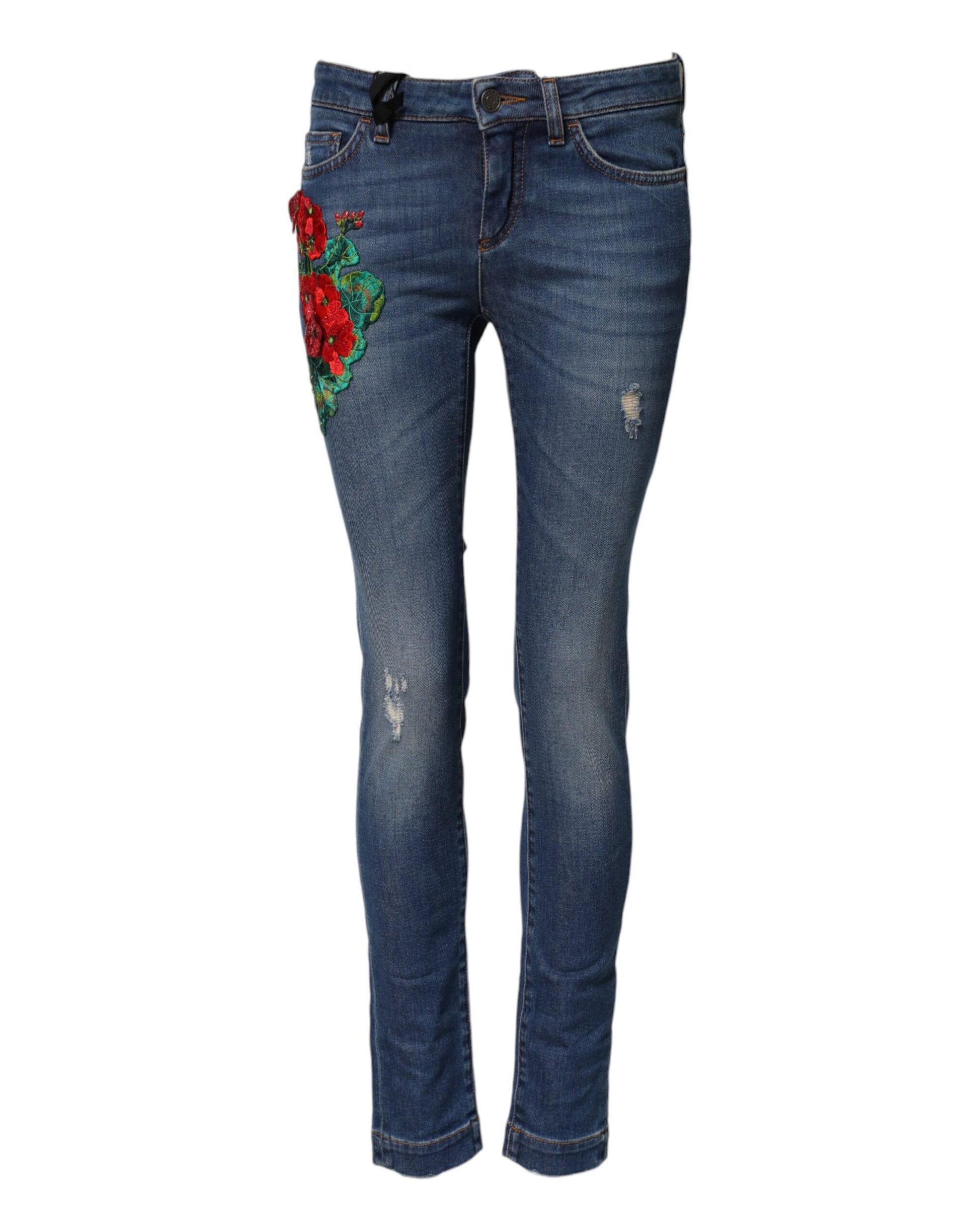 Pair of blue jeans with floral embroidery on thighs