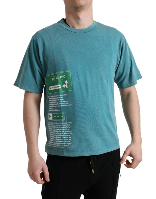 Man wearing blue t-shirt with white text on front