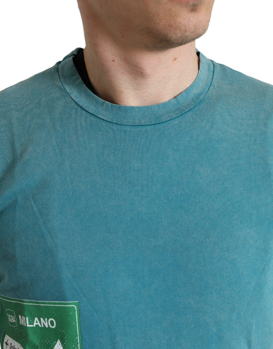 Man wearing blue t-shirt with white logo on chest
