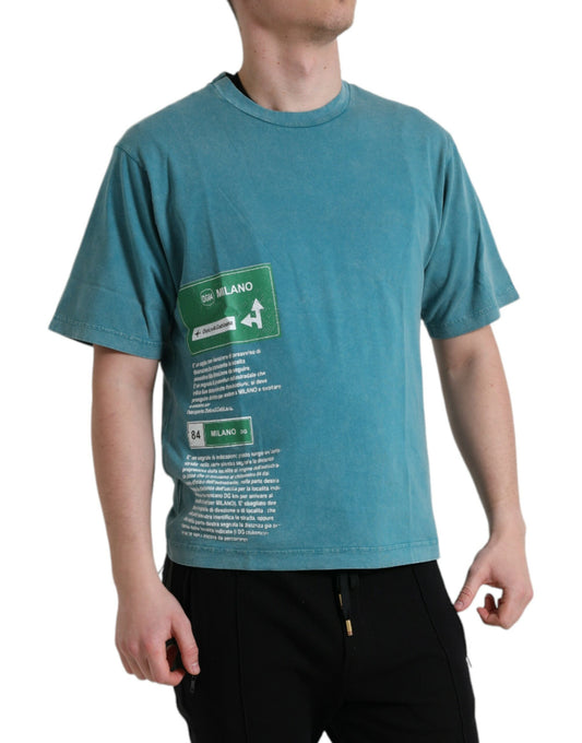 Man wearing blue t-shirt with white writing on front