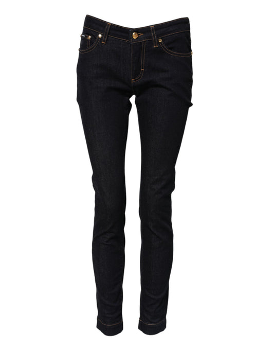 Pair of dark blue jeans with light wash detailing