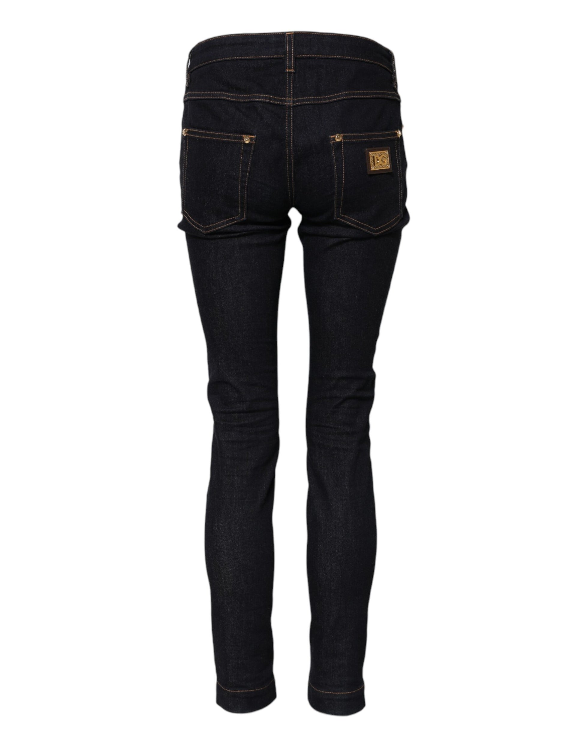 Pair of dark blue jeans with a lighter wash on the thighs