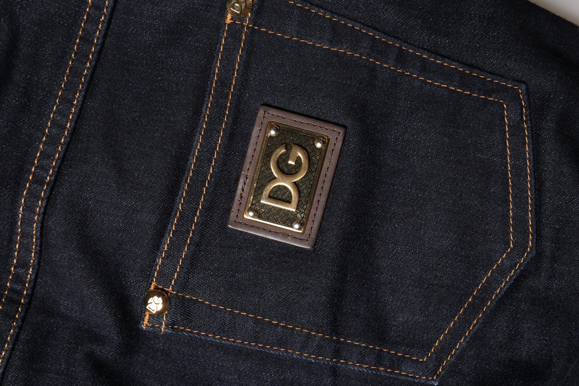 The jeans have a logo on the back pocket