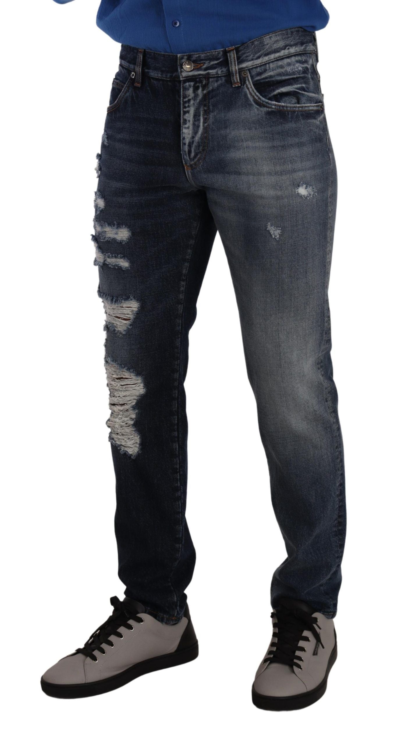 Person wearing blue jeans and sneakers