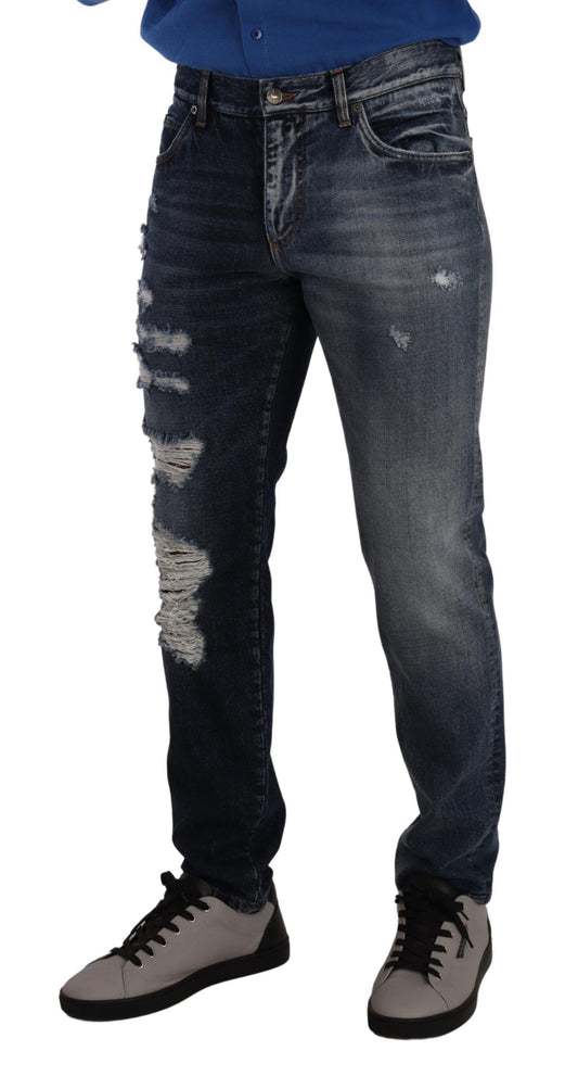 Person wearing blue jeans and sneakers