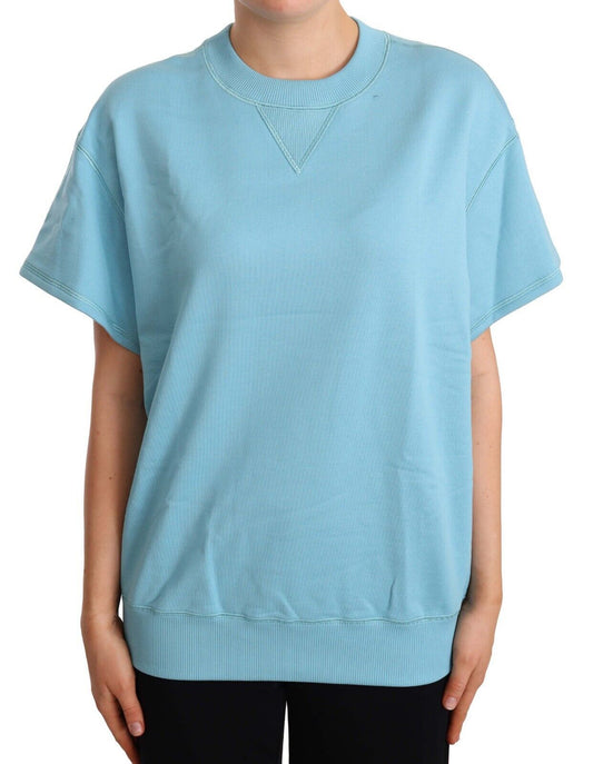 Long sleeve blue shirt on a mannequin