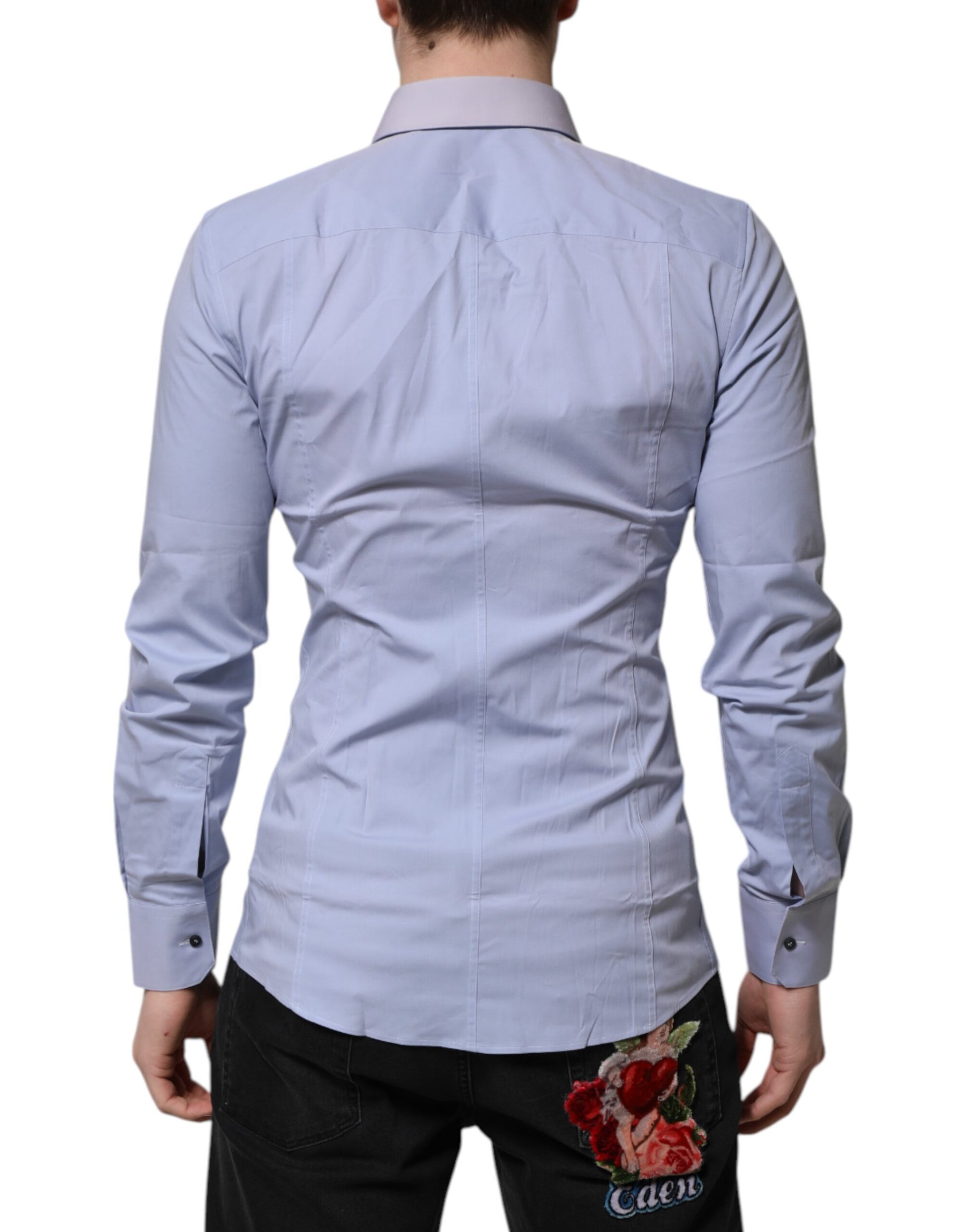 A long sleeve blue dress shirt with a Sicilia print on the back