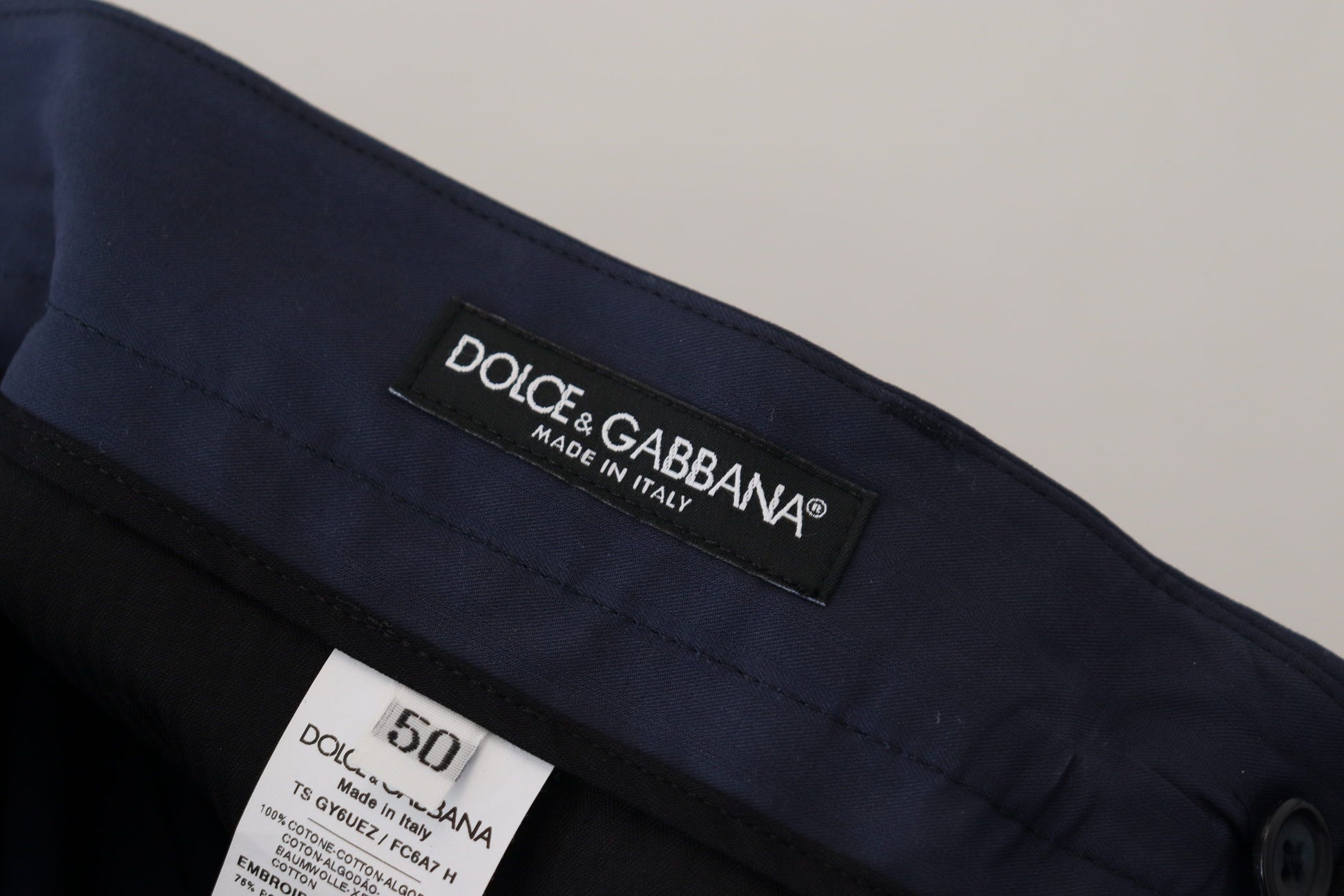 Blue jacket with black label on front