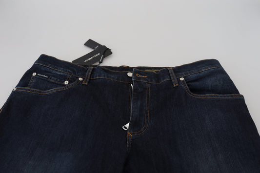 Pair of blue jeans on a white surface