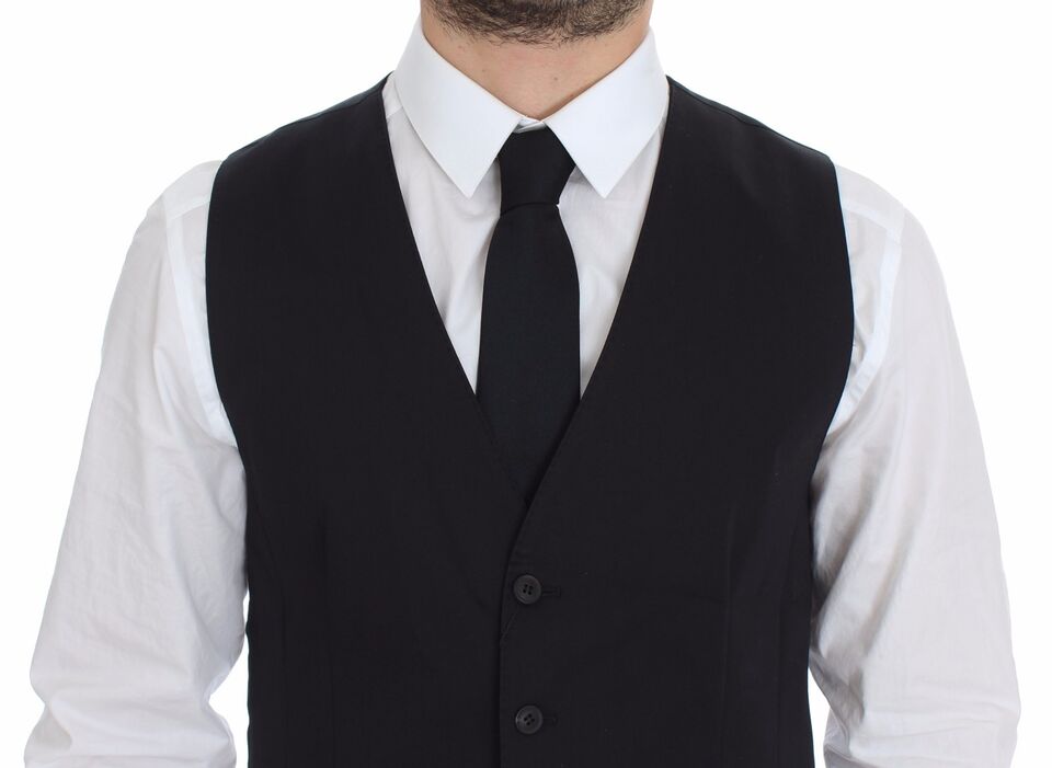 A mannequin wearing a blue cotton stretch vest blazer with black lapels