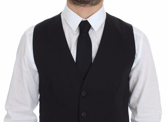 A mannequin wearing a blue cotton stretch vest blazer with black lapels