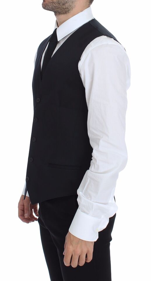 A mannequin wearing a blue cotton stretch dress vest blazer from Dolce & Gabbana