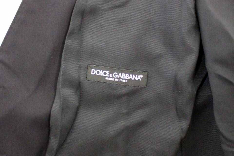 A blue cotton stretch dress vest blazer with a label that reads "Dolce & Gabbana"