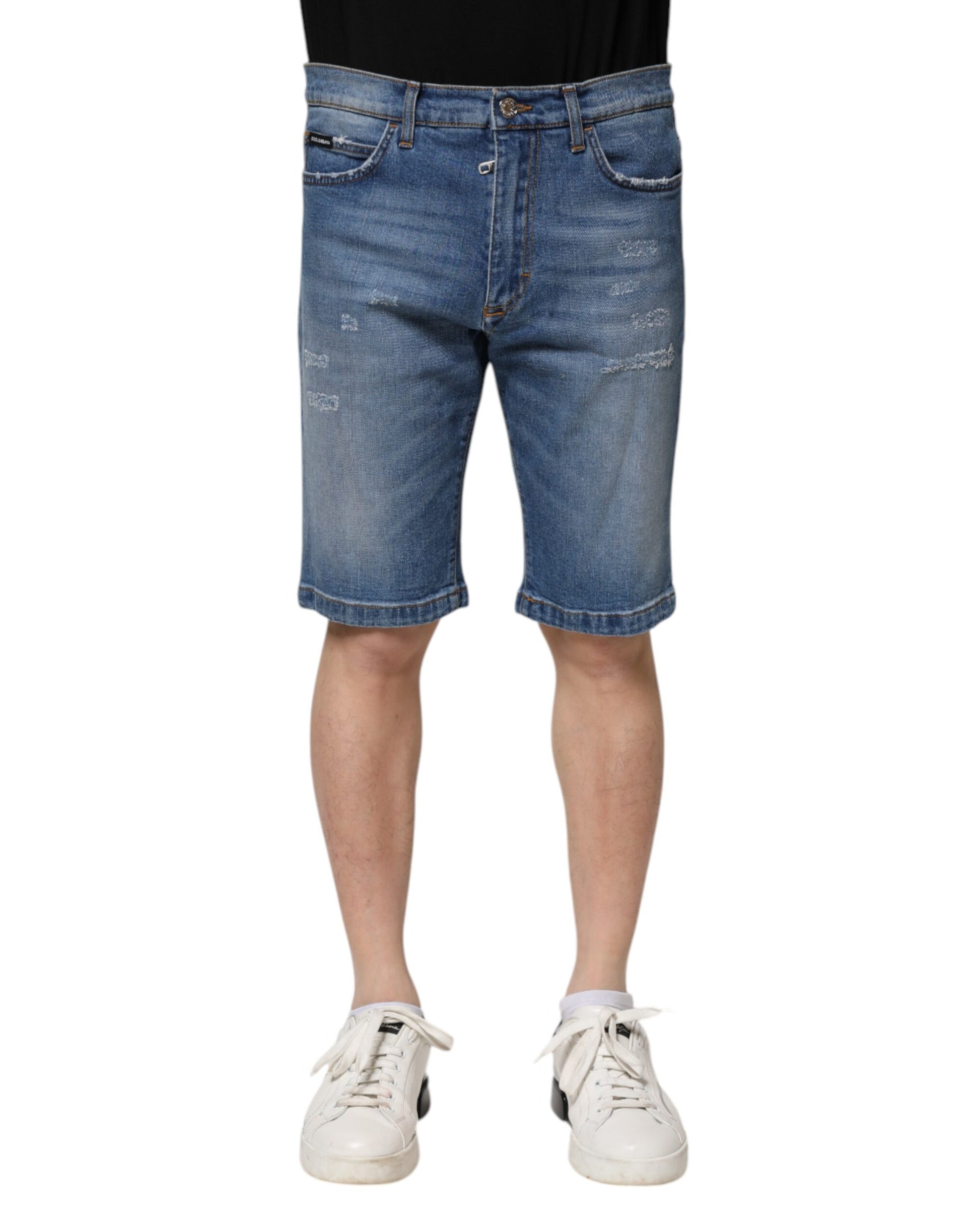 Mannequin wearing blue denim shorts