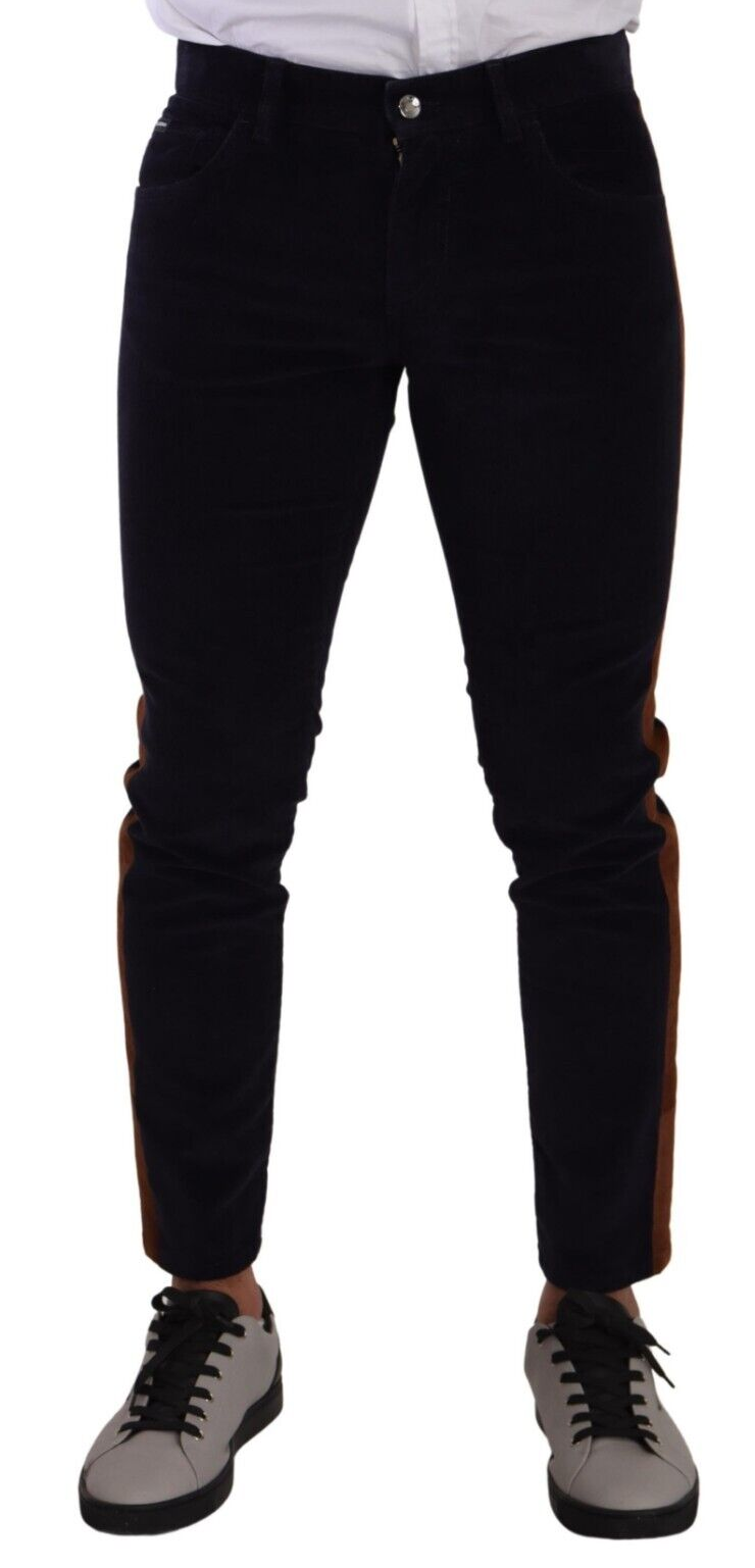 Pair of black pants with orange stripe on sides