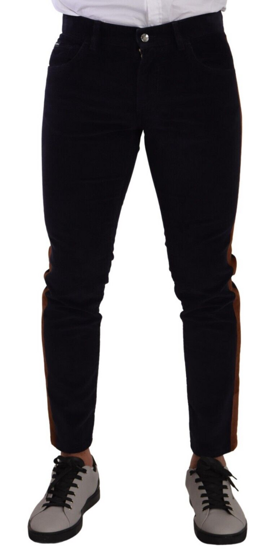 Pair of black pants with orange stripe on sides