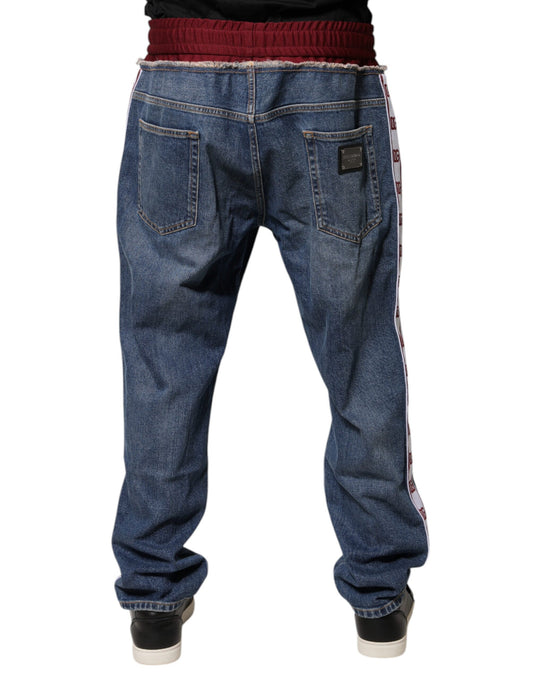 Pair of blue jeans with red stripe on side