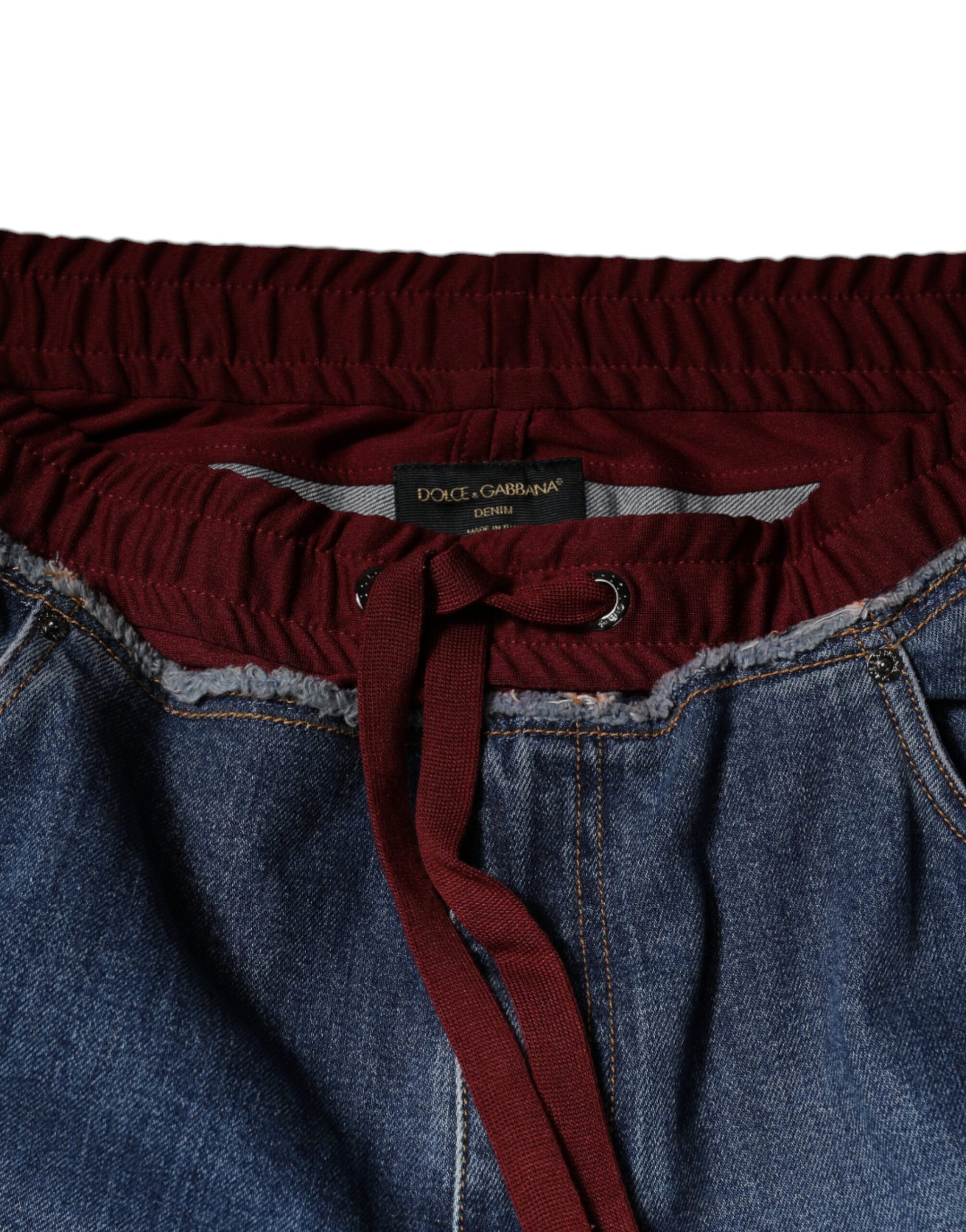 Red belt loops on blue jeans