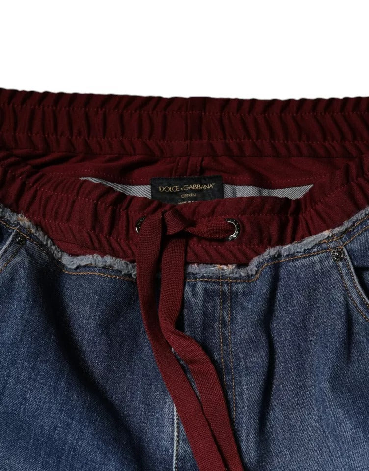 Pair of blue jeans with red belt loops