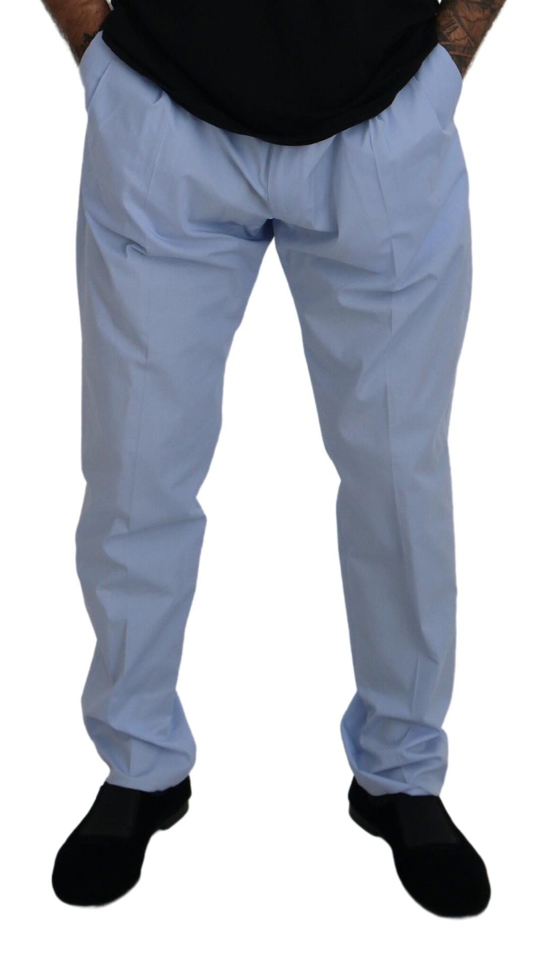 Man wearing blue pants and black shoes